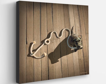 Anchored by Love Canvas - Black Puppy Dog Canvas Art Print | Nautical Seaside Beach House Decor | Coastal Pet Home  - Anchor Wall Art