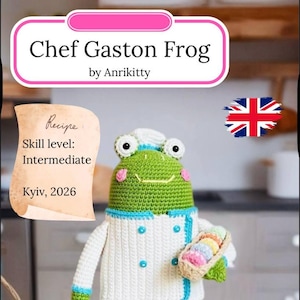 May include: A crocheted Chef Gaston Frog wearing a white chef's coat with blue trim and buttons, holding a basket of colorful treats. The image includes text that says "Chef Gaston Frog" and "Recipe: Skill level: Intermediate."