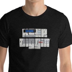 May include: A black t-shirt with a graphic design of a music production software interface. The text "keep diggin'" is displayed on the shirt.