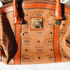 HCL Germany Genuine Leather Chestnut tone Leather Purse/hand