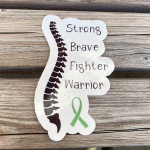 Strong Brave Fighter Warrior| Spinal Cord Injury Awareness Sticker with spine graphics.