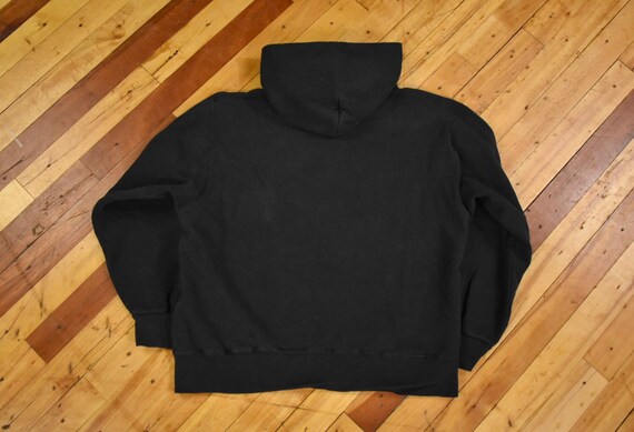 Plain black deals champion hoodie