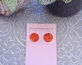 Fabric button earrings in a floral design.