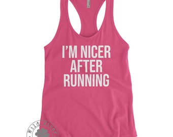 May include: Pink racerback tank top with the text "I'M NICER AFTER RUNNING" in white.