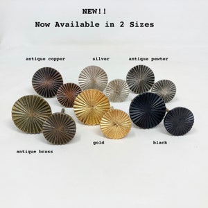 May include: Assortment of decorative round knobs in various finishes, including antique copper, silver, antique pewter, gold, black, and antique brass.  NEW!! Now Available in 2 Sizes.
