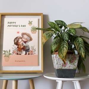 K&ouml;nnte beinhalten: Eine gerahmte Illustration einer Gro&szlig;mutter und ihrer Enkelin, die sich umarmen. Die Illustration ist im Aquarellstil mit rosa, gr&uuml;nen und braunen Farben gehalten. Der Text "Happy Mother's Day" befindet sich oben auf der Illustration. Der Text "@reallygreatsite" befindet sich unten auf der Illustration.