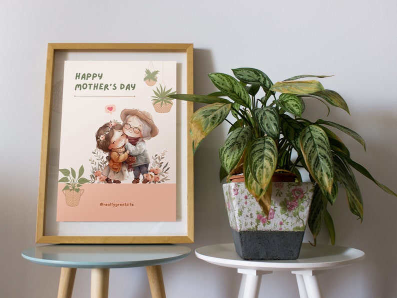 K&ouml;nnte beinhalten: Eine gerahmte Illustration einer Gro&szlig;mutter und ihrer Enkelin, die sich umarmen. Die Illustration ist im Aquarellstil mit rosa, gr&uuml;nen und braunen Farben gehalten. Der Text "Happy Mother's Day" befindet sich oben auf der Illustration. Der Text "@reallygreatsite" befindet sich unten auf der Illustration.