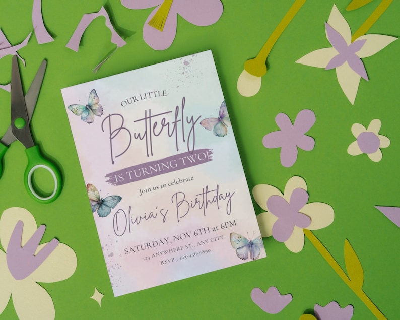 May include: A colorful invitation with a watercolor background featuring butterflies and the text "Our Little Butterfly is Turning Two!"  Join us to celebrate Olivia's Birthday. Saturday, Nov 6th at 6 PM.  Anywhere St., Any City. RSVP: 123-456-7890.
