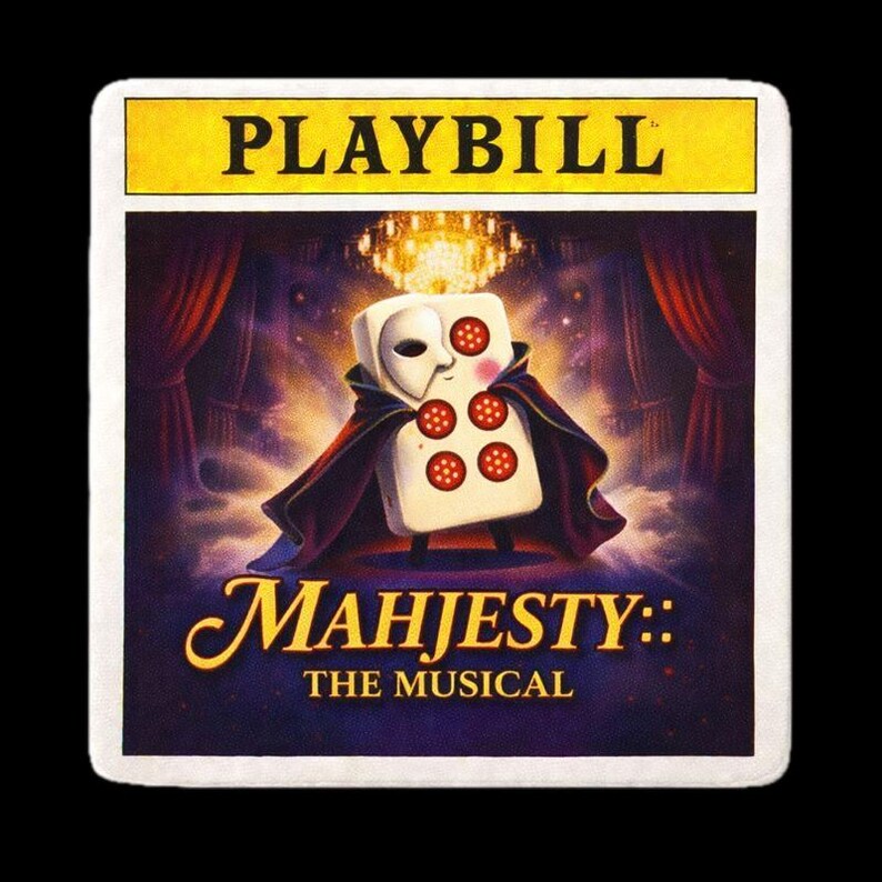 May include: Playbill for "Mahjesty: The Musical" with a white die character wearing a mask and cape. The playbill has a yellow banner with the word "PLAYBILL" and a purple background with a chandelier and curtains.