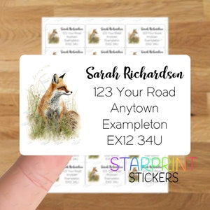 May include: A white rectangular sticker with a red fox illustration and the text "Sarah Richardson, 123 Your Road, Anytown Exampleton, EX12 34U". The sticker is printed with the text "Starprint Stickers" in the bottom right corner.