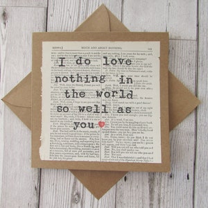 square greeting card with a book page from Much ado about nothing attached with the quote I do love nothing in the world so well as you printed on it