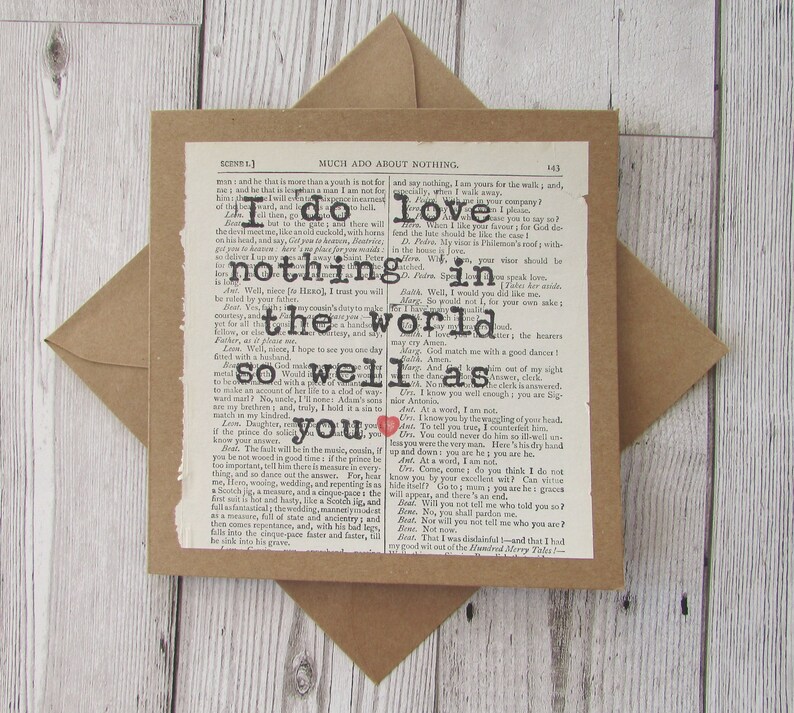 square greeting card with a book page from Much ado about nothing attached with the quote I do love nothing in the world so well as you printed on it