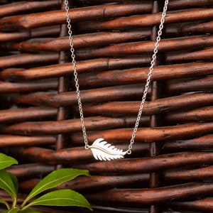 Feather Necklace, sterling silver feather necklace with yellow gold detail