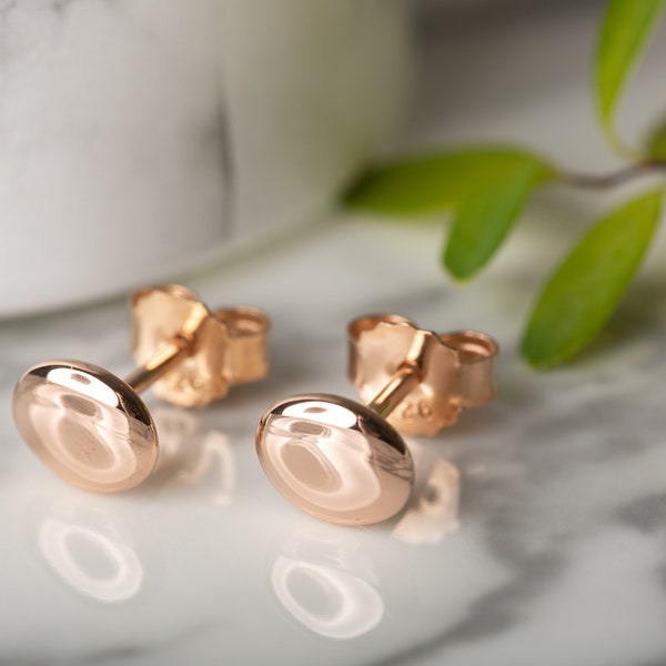 Rose Gold Pebble Stud Earrings, tactile pebble shaped earrings in solid silver coated with 14ct rose gold