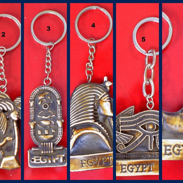 Ancient egyptian key chain , king tut , eye of hours, camel , ... antique looking