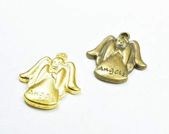 May include: Two gold angel charms with the word "Angels" inscribed on the bottom. The charms are in the shape of an angel with wings and a halo.