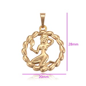 May include: Gold-toned pendant featuring the astrological symbol for Virgo, a woman holding a sheaf of wheat, within a circular frame. The pendant measures 28mm in height and 20mm in width.