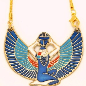 May include: Gold necklace with a blue and turquoise enamel pendant depicting a winged goddess holding a sphere. The pendant is detailed with gold trim and white accents.