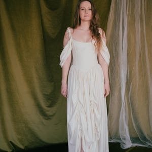 Ivory bridal dress with ruched detail and corset top