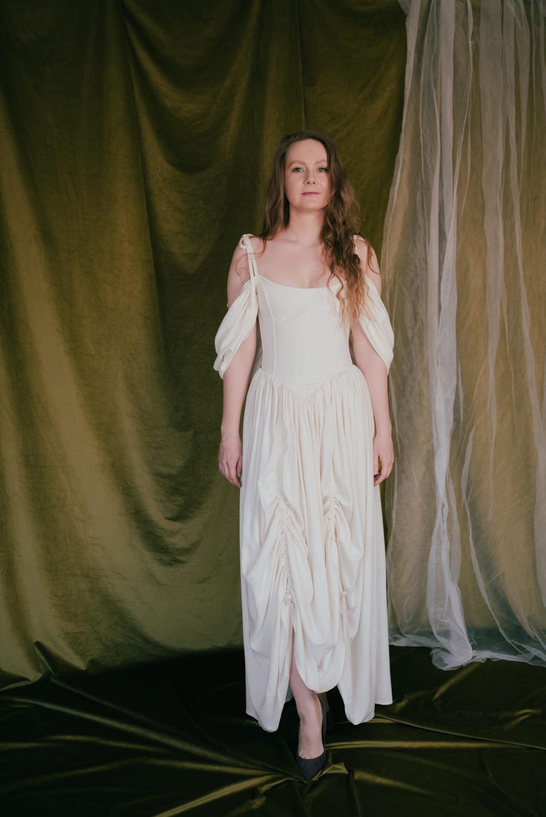 Ivory bridal dress with ruched detail and corset top