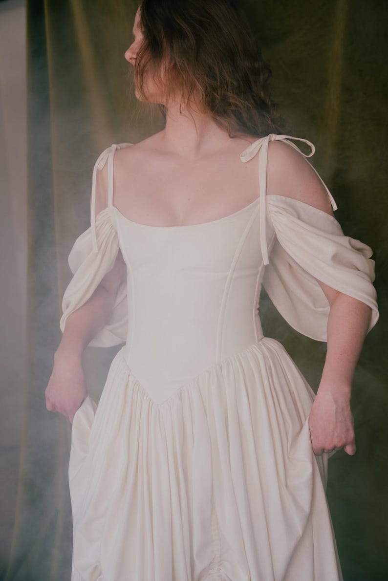 Renaissance inspired corset wedding dress with puff sleeves