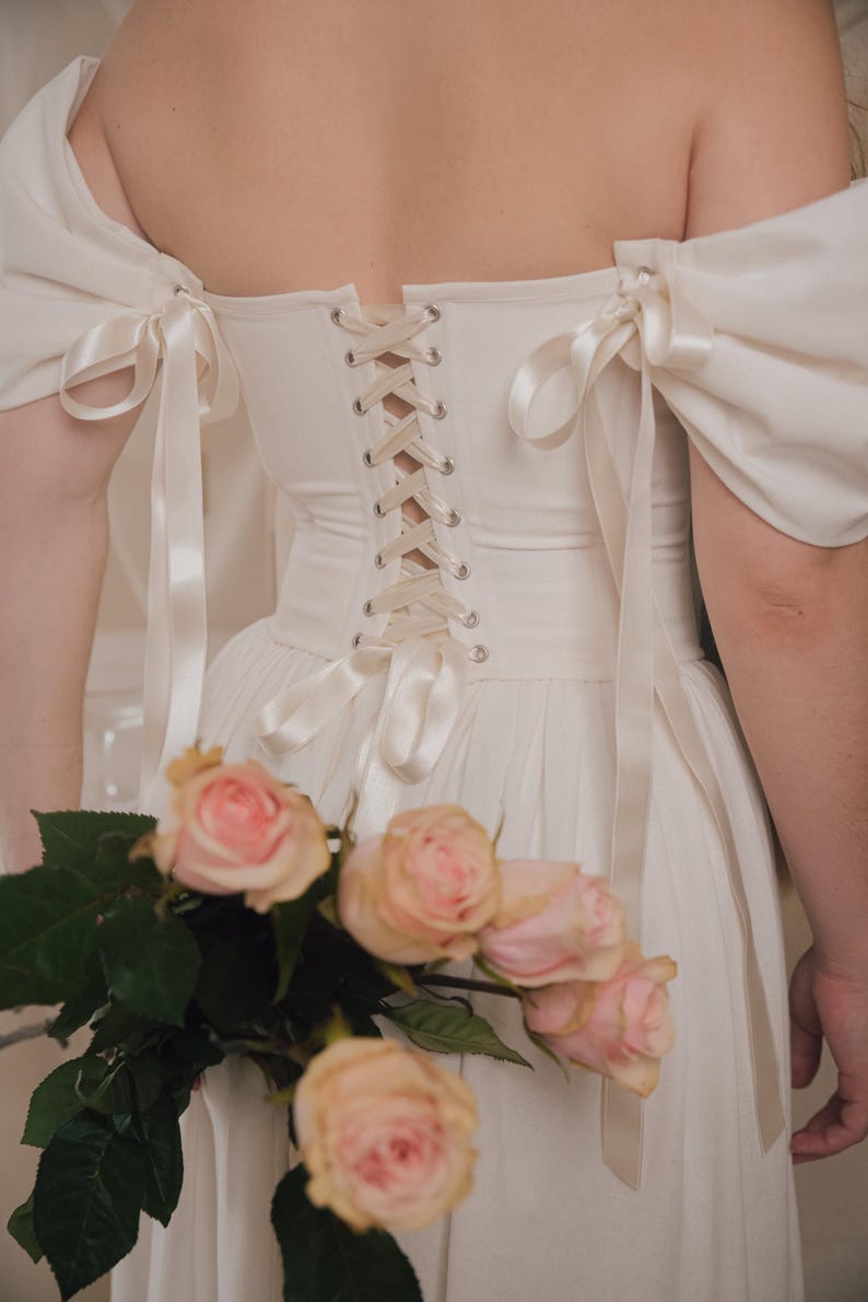 ivory fantasy wedding dress with lace up back and lightweight linen fabric