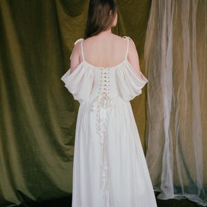 Romantic wedding dress with off shoulder sleeves and full skirt