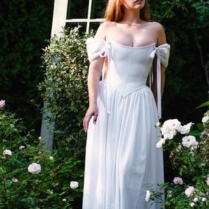 romantic garden wedding white dress renaissance fairy bridal gown outdoor photoshoot
