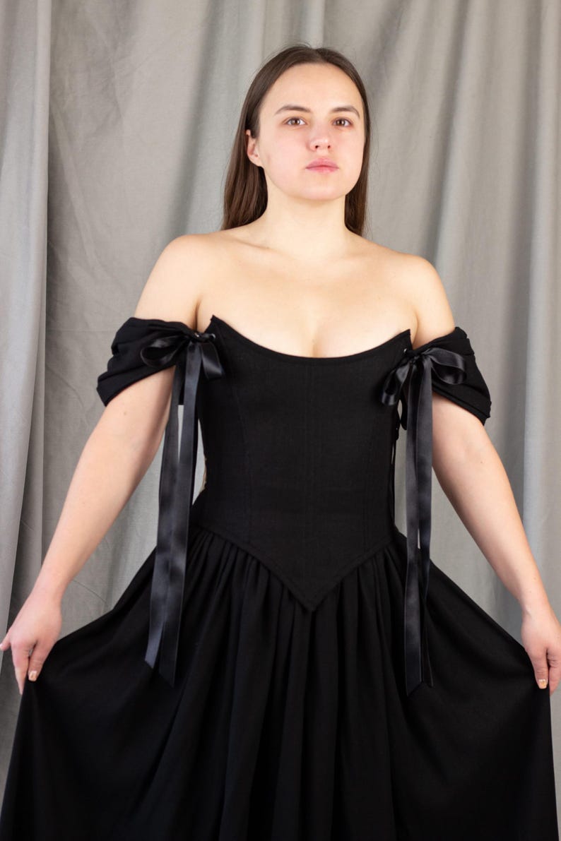 gothic black wedding dress with structured corset and soft skirt