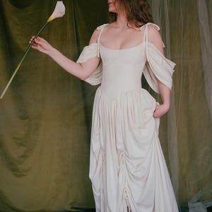 Ivory wedding dress with detachable off shoulder sleeves