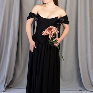 black gothic wedding dress with corset bodice and off shoulder sleeves