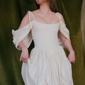 Ivory linen corset wedding dress with off shoulder sleeves