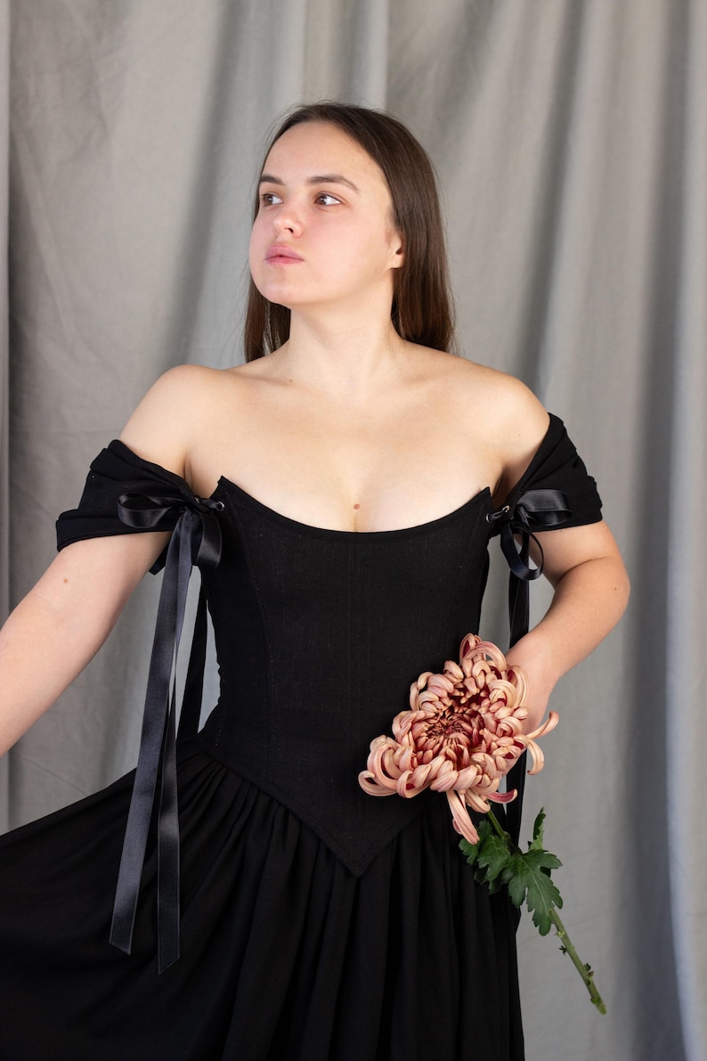 black renaissance inspired corset dress with ribbon sleeves