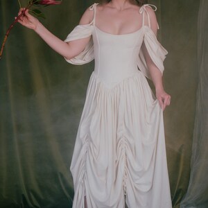 Elegant corset wedding dress with soft draped skirt