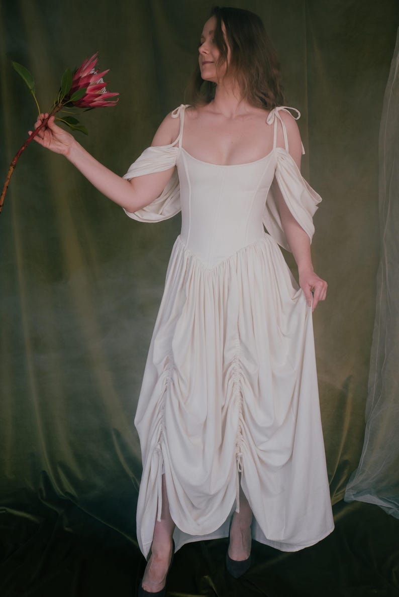Elegant corset wedding dress with soft draped skirt