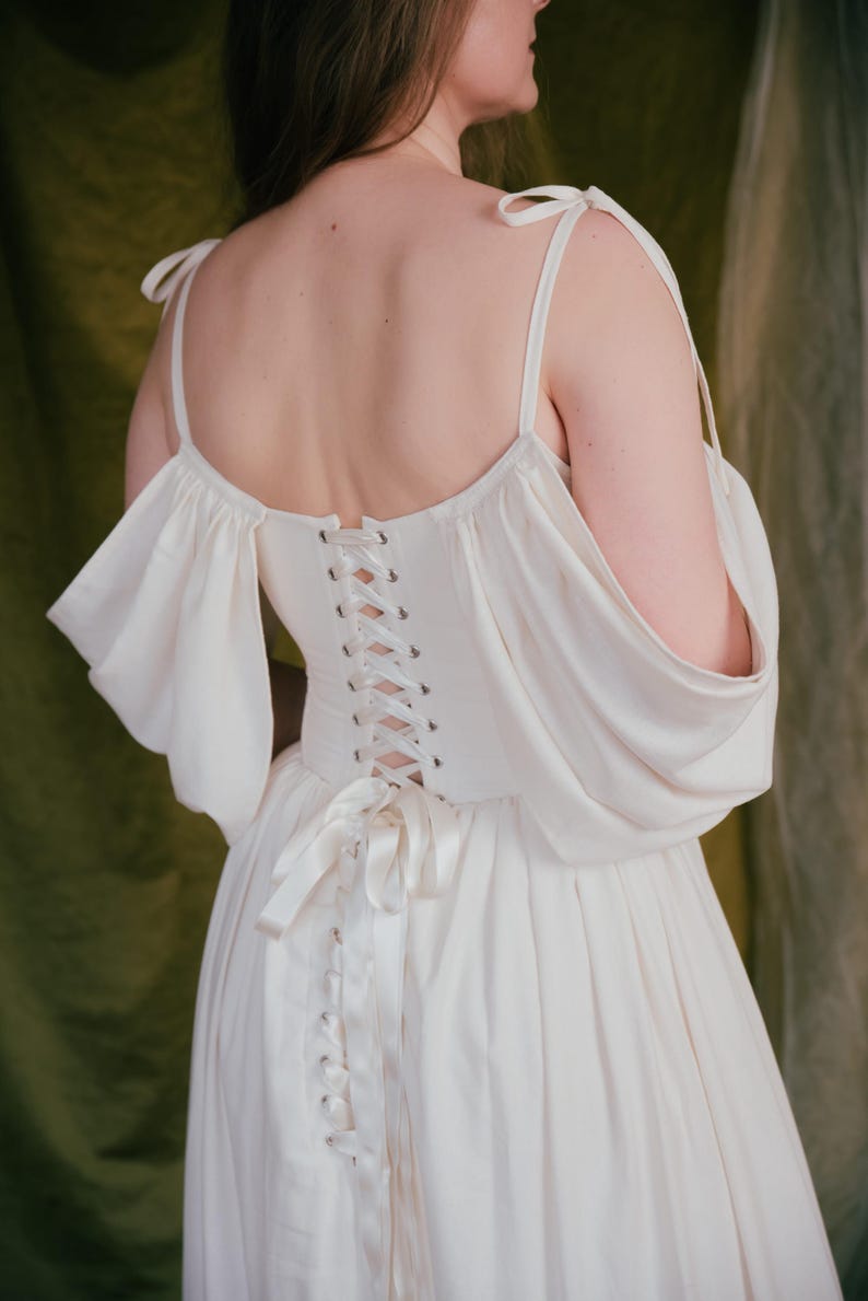 Linen wedding dress with romantic gathered skirt and soft sleeves