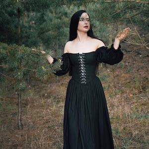 Black renaissance corset dress with off the shoulder puff sleeves, linen skirt, forest photoshoot