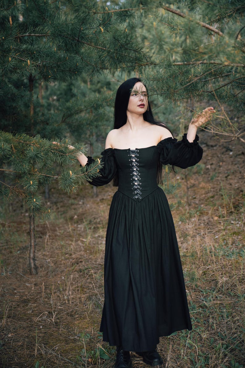 Black renaissance corset dress with off the shoulder puff sleeves, linen skirt, forest photoshoot