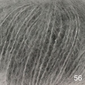 May include: Close-up of a gray yarn with a subtle shimmer. The yarn is soft and fluffy, with a delicate texture.