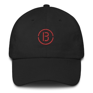 May include: A black baseball cap with a red embroidered circle containing the letter "B".