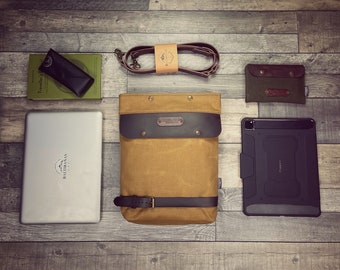 Large waxed canvas bike messenger, bike saddlebag to carry laptop and tablet.