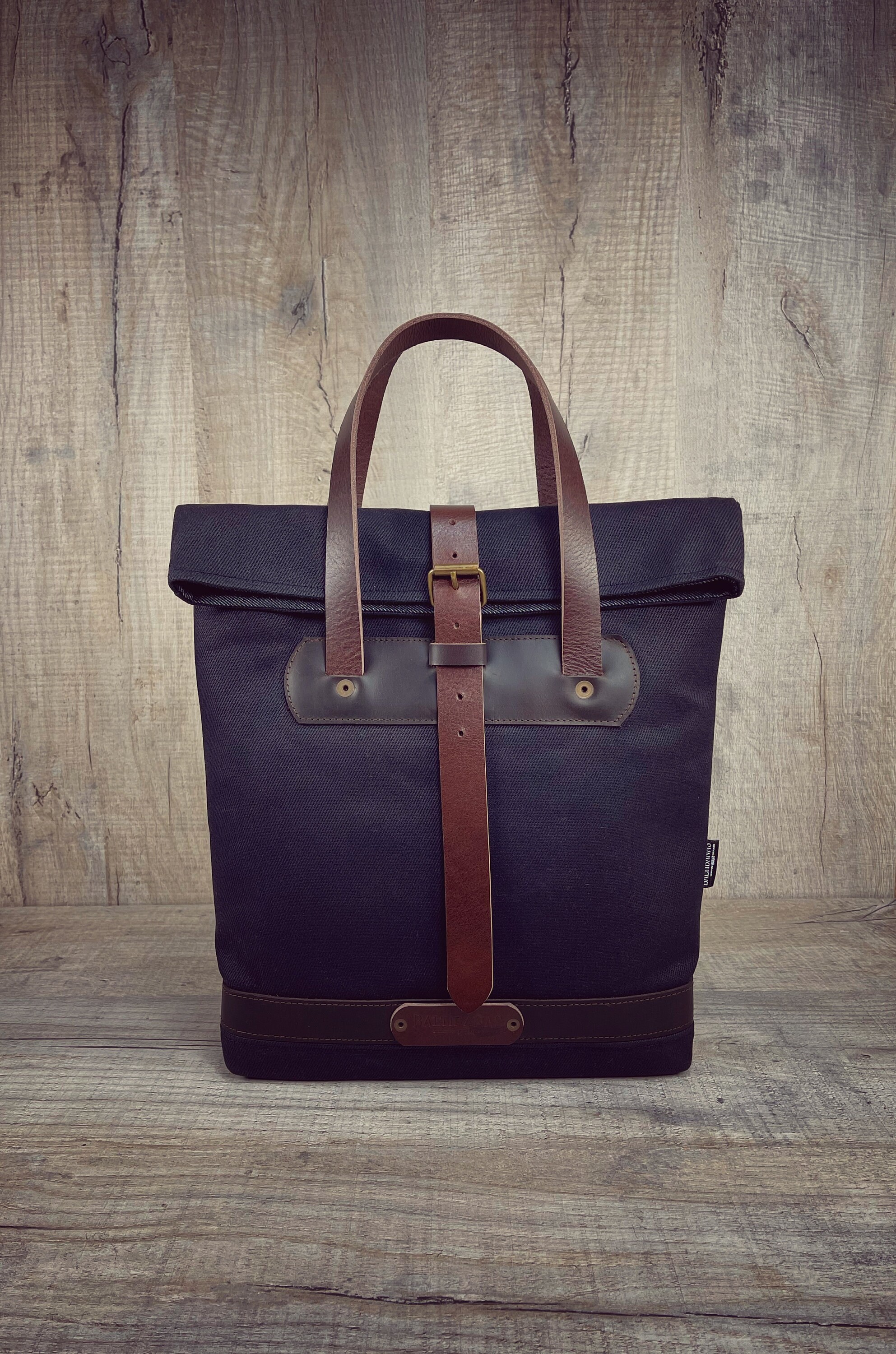 Waxed canvas tote bag convertible backpack, slim office bag for laptop and tablet.