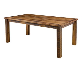May include: A rustic wooden dining table with a rectangular top and four legs. The table is made of reclaimed wood and has a natural finish.