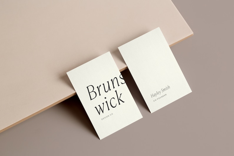 May include: Two white business cards. The first card has the text "Brunswick Design Co." The second card has the text "Hayley Smith Co-Founder".
