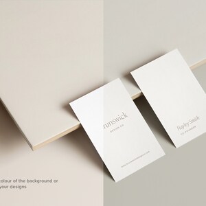 May include: Two white business cards on a light beige surface. The top card has the text "runswick DESIGN CO" and a website address. The bottom card has the text "Hayley Smith CO-FOUNDER".