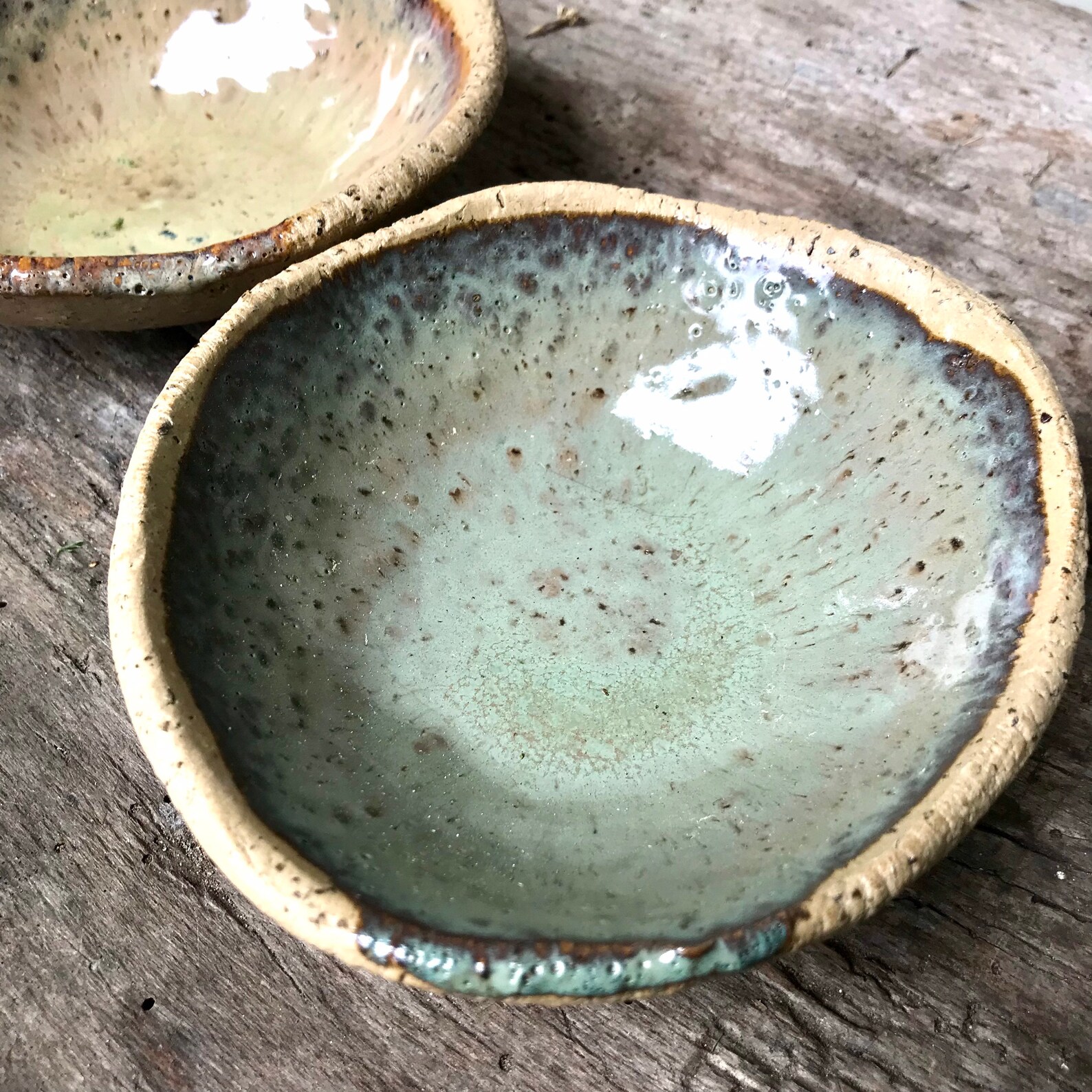 Two beautiful little rustic bowls with rich green glazes. Etsy