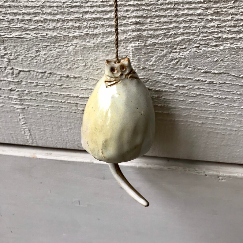 Daisy unique gift for a cat lover! Ceramic cat bell with an off-white shiny glaze