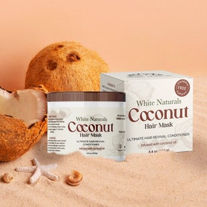 May include: Two jars of White Naturals Coconut Hair Mask, one with a brown lid and the other with a white lid. Both jars are labeled with the product name and description. The jars are sitting on a sandy surface with a coconut half and a starfish.