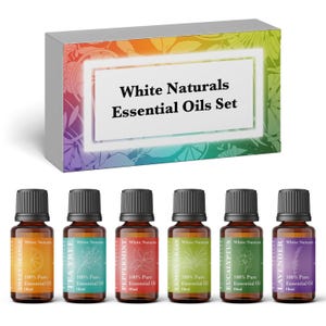 May include: A White Naturals essential oils set featuring a rectangular box with a rainbow-coloured botanical print and six 10ml amber glass bottles. Each bottle has a black cap and a coloured label with the text White Naturals 100% Pure Essential Oil.