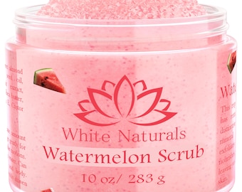 Könnte beinhalten: Ein rosa Glas mit Wassermelonen-Peeling mit einem weißen Lotusblüten-Logo und dem Text "White Naturals Watermelon Scrub 10 oz/283 g".